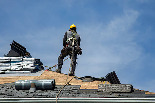 Professional Roofing technician working in Montague, MA